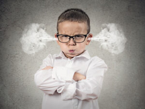 angry upset boy little man blowing pathdoc fotolia.com